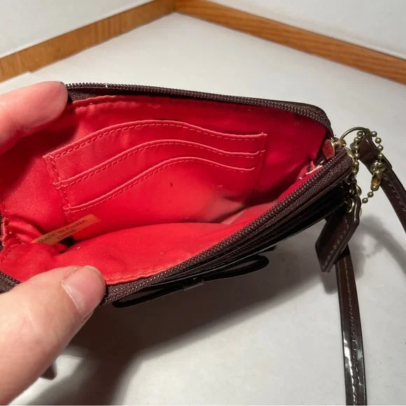 Coach Wristlet Brown Signature Pattern w Brown Patent Leather Trim Orange Inside - Picture 6 of 10